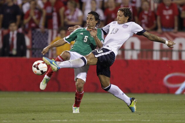 United States' Jermaine Jones, right, and Mexico's Fernando Arce scramble for a loose ball during the second half of a World Cup qualifying soccer match Tuesday, Sept. 10, 2013, in Columbus, Ohio. The United States defeated Mexico 2-0. (AP Photo/Jay LaPrete) United States' Jermaine Jones, right, and Mexico's Fernando Arce scramble for a loose ball during the second half of a World Cup qualifying soccer match Tuesday, Sept. 10, 2013, in Columbus, Ohio. The United States defeated Mexico 2-0. (AP Photo/Jay LaPrete)