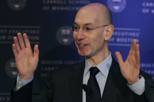 NBA commissioner Adam Silver gestures during an address, Wednesday, March 12, 2014, in Boston. Silver commented on some teams with losing records NBA commissioner Adam Silver gestures during an address, Wednesday, March 12, 2014, in Boston. Silver commented on some teams with losing records