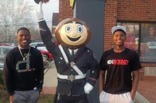 Darnay Holmes, left, learned more about the Buckeyes with Keyshawn Johnson Jr.