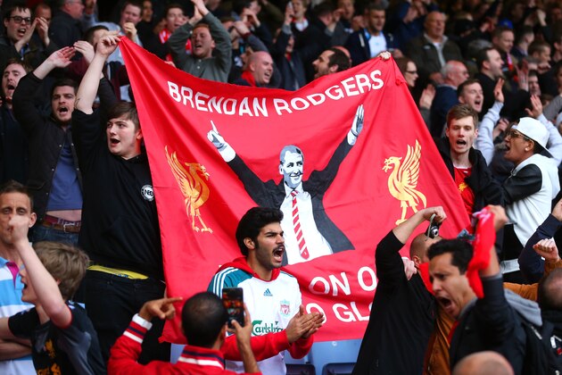 LONDON, ENGLAND - APRIL 06:  Liverpool fans celebrate following their team's 2-1 victory during the Barclays Premier League match between West Ham United and Liverpool at Boleyn Ground on April 6, 2014 in London, England.  (Photo by Julian Finney/Getty Images)