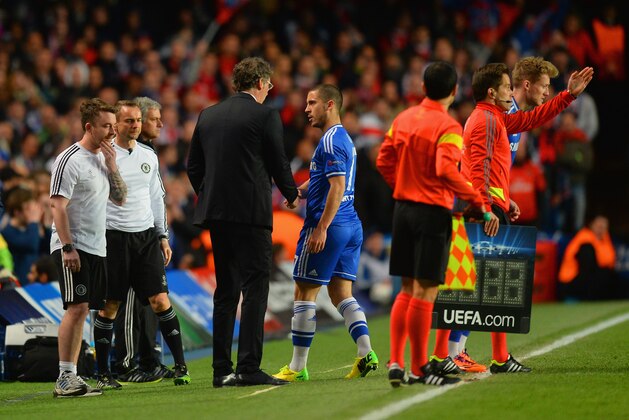 LONDON, ENGLAND - APRIL 08: Head Coach Laurent Blanc of PSG shakes hands with Eden Hazard of Chelsea as he is replaced by Andre Schurrle of Chelsea during the UEFA Champions League Quarter Final second leg match between Chelsea and Paris Saint-Germain FC at Stamford Bridge on April 8, 2014 in London, England. (Photo by Mike Hewitt/Getty Images) LONDON, ENGLAND - APRIL 08: Head Coach Laurent Blanc of PSG shakes hands with Eden Hazard of Chelsea as he is replaced by Andre Schurrle of Chelsea during the UEFA Champions League Quarter Final second leg match between Chelsea and Paris Saint-Germain FC at Stamford Bridge on April 8, 2014 in London, England. (Photo by Mike Hewitt/Getty Images)