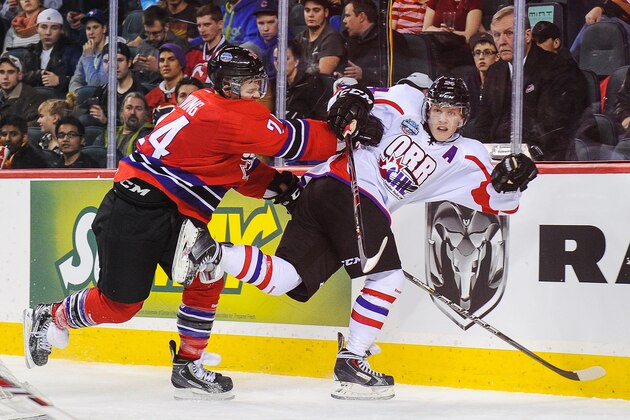 CALGARY, AB - JANUARY 15: Nikolaj Ehlers #24 of Team Orr gets shoved into the boards by Aaron Irving #24 of Team Cherry during the CHL Top Prospects game at Scotiabank Saddledome on January 15, 2014 in Calgary, Alberta, Canada. Team Orr defeated Team Cherry 4-3. (Photo by Derek Leung/Getty Images) CALGARY, AB - JANUARY 15: Nikolaj Ehlers #24 of Team Orr gets shoved into the boards by Aaron Irving #24 of Team Cherry during the CHL Top Prospects game at Scotiabank Saddledome on January 15, 2014 in Calgary, Alberta, Canada. Team Orr defeated Team Cherry 4-3. (Photo by Derek Leung/Getty Images)