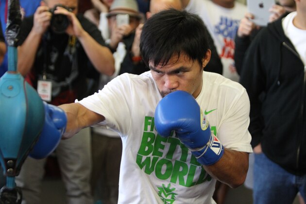 HOLLYWOOD, CA - APRIL 2:  Boxer Manny Pacquiao hits the double end bag during his media workout day at the Wild Card Boxing Gym on April 2, 2014 in Hollywood, California (Photo by Alexis Cuarezma/Getty Images)