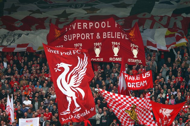 LIVERPOOL, ENGLAND - MARCH 30:  Liverpool fans show their support during the Barclays Premier League match between Liverpool and Tottenham Hotspur at Anfield on March 30, 2014 in Liverpool, England.  (Photo by Alex Livesey/Getty Images)