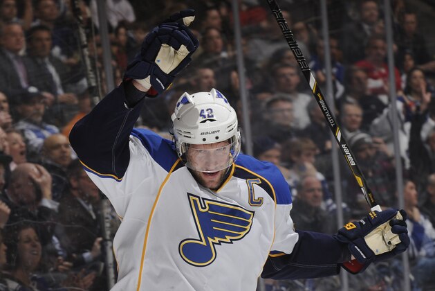 TORONTO, ON - MARCH 25:  David Backes #42 of the St. Louis Blues celebrates a first period goal during NHL game action against the Toronto Maple Leafs March 25, 2014 at the Air Canada Centre in Toronto, Ontario, Canada. (Photo by Graig Abel/NHLI via Getty Images)