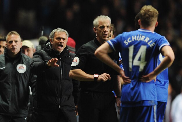 BIRMINGHAM, ENGLAND - MARCH 15:  Jose Mourinho manager of Chelsea protests to referee Chris Foy during the Barclays Premier League match between Aston Villa and Chelsea at Villa Park on March 15, 2014 in Birmingham, England.  (Photo by Chris Brunskill/Getty Images)