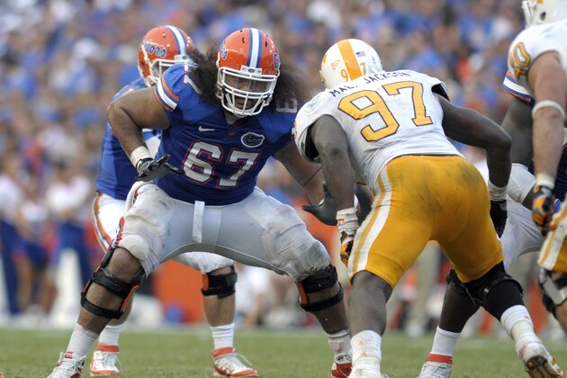 Florida offensive lineman Jon Halapio (67) prepares to block Tennessee's Malik Jackson during an NCAA college football game in Gainesville, Fla., Saturday, Sept. 17, 2011.(AP Photo/Phelan M. Ebenhack)