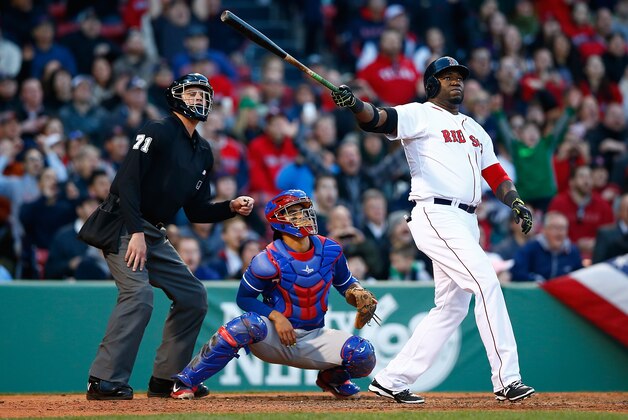 BOSTON, MA - APRIL 09:  David Ortiz #34 of the Boston Red Sox watches the ball after hitting a three-run home run in the 8th inning against the Texas Rangers at Fenway Park on April 9, 2014 in Boston, Massachusetts.  (Photo by Jared Wickerham/Getty Images)
