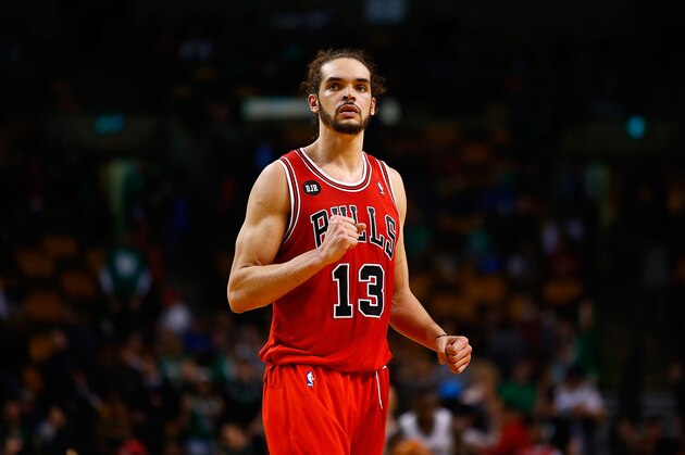 Chicago Bulls center Joakim Noah walks towards the bench during the closing minutes of an NBA basketball game against the Portland Trail Blazers Friday, March 28, 2014, in Chicago. The Trail Blazers won 91-74. (AP Photo/Charles Rex Arbogast)