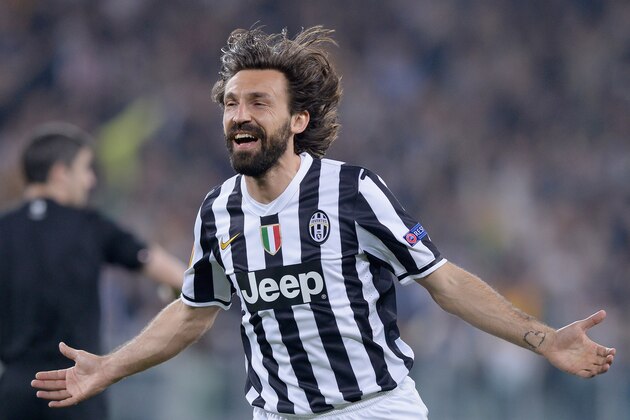 TURIN, ITALY - APRIL 10:  Andrea Pirlo of Juventus celebrates scoring the first goal during the UEFA Europa League quarter final match between Juventus and Olympique Lyonnais at Juventus Arena on April 10, 2014 in Turin, Italy.  (Photo by Claudio Villa/Getty Images)