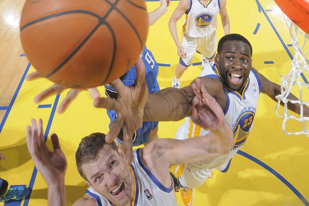 OAKLAND, CA - MARCH 18: Draymond Green # 23 and David Lee #10 of the Golden State Warriors rebound against the Orlando Magic on March 18, 2014 at Oracle Arena in Oakland, California. NOTE TO USER: User expressly acknowledges and agrees that, by downloading and or using this photograph, user is consenting to the terms and conditions of Getty Images License Agreement. Mandatory Copyright Notice: Copyright 2014 NBAE (Photo by Rocky Widner/NBAE via Getty Images) OAKLAND, CA - MARCH 18: Draymond Green # 23 and David Lee #10 of the Golden State Warriors rebound against the Orlando Magic on March 18, 2014 at Oracle Arena in Oakland, California. NOTE TO USER: User expressly acknowledges and agrees that, by downloading and or using this photograph, user is consenting to the terms and conditions of Getty Images License Agreement. Mandatory Copyright Notice: Copyright 2014 NBAE (Photo by Rocky Widner/NBAE via Getty Images)