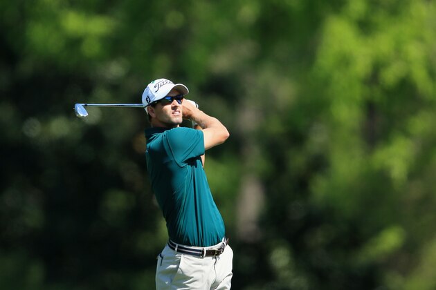 AUGUSTA, GA - APRIL 10:  Adam Scott of Australia watches his approach shot on the fiifth hole during the first round of the 2014 Masters Tournament at Augusta National Golf Club on April 10, 2014 in Augusta, Georgia.  (Photo by David Cannon/Getty Images)
