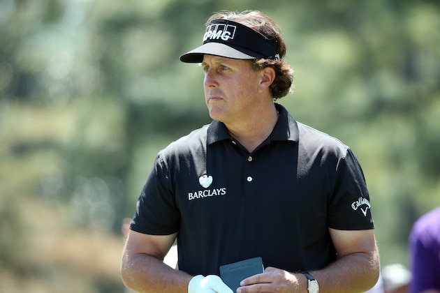 AUGUSTA, GA - APRIL 10:  Phil Mickelson of the United States waits on the first green during the first round of the 2014 Masters Tournament at Augusta National Golf Club on April 10, 2014 in Augusta, Georgia.  (Photo by Andrew Redington/Getty Images)