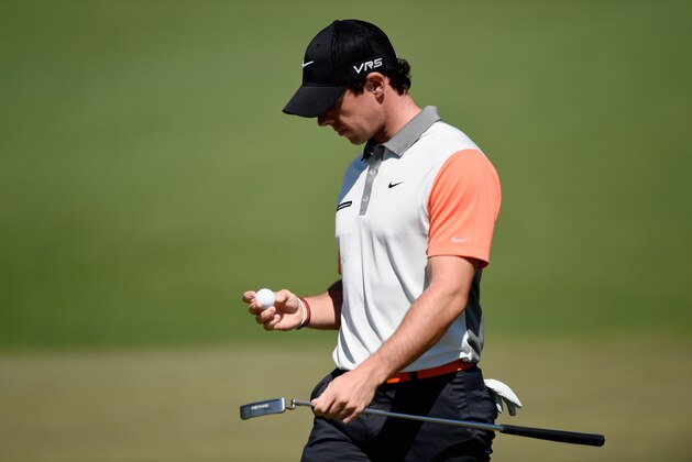 AUGUSTA, GA - APRIL 10: Rory McIlroy of Northern Ireland looks at his golf ball on the second hole during the first round of the 2014 Masters Tournament at Augusta National Golf Club on April 10, 2014 in Augusta, Georgia.  (Photo by Harry How/Getty Images)
