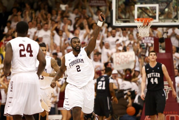 Feb 16, 2013; Bronx, NY, USA; Fordham Rams forward Travion Leonard (2) celebrates on the court against the Butler Bulldogs during the first half at Rose Hill Gym. Mandatory Credit: Debby Wong-USA TODAY Sports