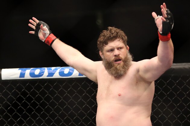 Roy Nelson celebrates his win over Cheick Kongo after their UFC 159 Mixed Martial Arts heavyweight bout in Newark, NJ, Saturday, April 27,2013.  Nelson won via first round KO. (AP Photo/Gregory Payan)