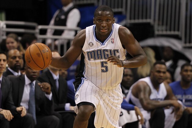Jan 15, 2014; Orlando, FL, USA; Orlando Magic shooting guard Victor Oladipo (5) drives to the basket against the Chicago Bulls during the second half  at Amway Center. Chicago Bulls defeated the Orlando Magic 128-125 in triple overtime. Mandatory Credit: Kim Klement-USA TODAY Sports