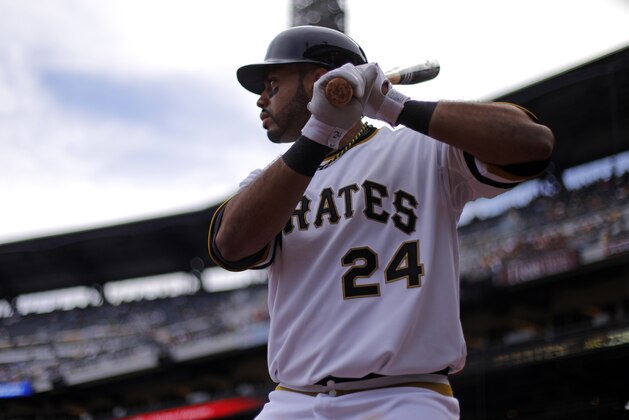 Pittsburgh Pirates' Pedro Alvarez (24) warms up on deck during the first inning of a baseball game against the St. Louis Cardinals in Pittsburgh Sunday, April 6, 2014. The Pirates won 2-1. (AP Photo/Gene J. Puskar)