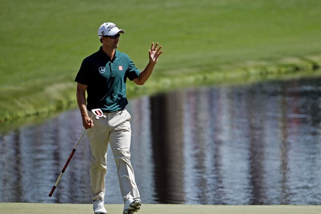 Adam Scott, of Australia, waves after putting on the 16th hole during the first round of the Masters golf tournament Thursday, April 10, 2014, in Augusta, Ga. (AP Photo/Matt Slocum) Adam Scott, of Australia, waves after putting on the 16th hole during the first round of the Masters golf tournament Thursday, April 10, 2014, in Augusta, Ga. (AP Photo/Matt Slocum)
