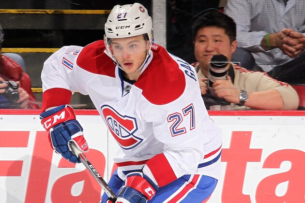 DETROIT, MI - MARCH 27:  Alex Galchenyuk #27 of the Montreal Canadiens skates with the puck during an NHL game against the Detroit Red Wings on March 27, 2014 at Joe Louis Arena in Detroit, Michigan. Montreal defeated Detroit 5-4 (Photo by Dave Reginek/NHLI via Getty Images)