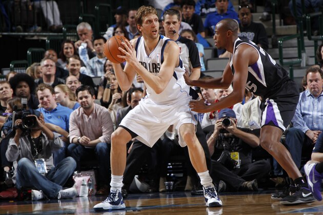 DALLAS, TX - MARCH 29: Dirk Nowitzki #41 of the Dallas Mavericks handles the ball against the Sacramento Kings on March 29, 2014 at the American Airlines Center in Dallas, Texas. NOTE TO USER: User expressly acknowledges and agrees that, by downloading and or using this photograph, User is consenting to the terms and conditions of the Getty Images License Agreement. Mandatory Copyright Notice: Copyright 2014 NBAE (Photo by Glenn James/NBAE via Getty Images)