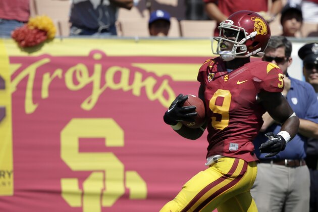 Southern California wide receiver Marqise Lee scores on a 80-yard pass play against Boston College during the first half of an NCAA college football game in Los Angeles, Saturday, Sept. 14, 2013. (AP Photo/Chris Carlson)