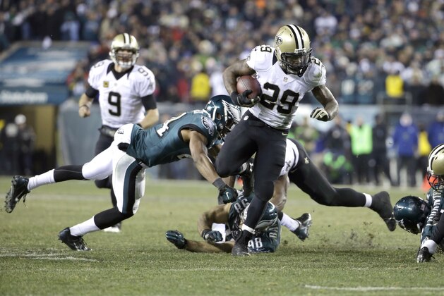 New Orleans Saints' Khiry Robinson runs during the second half of an NFL wild-card playoff football game against the Philadelphia Eagles, Saturday, Jan. 4, 2014, in Philadelphia. (AP Photo/Matt Rourke)