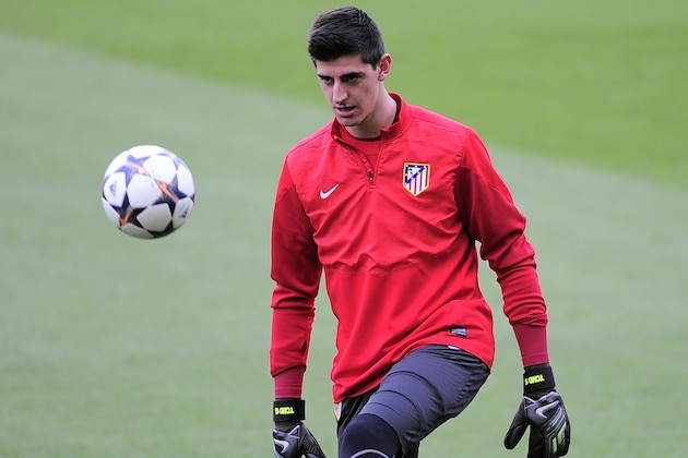 Atletico Madrid's goalkeeper Thibaut Courtois attends a training session at the Camp Nou stadium in Barcelona, Spain, Monday, March 31, 2014. FC Barcelona will face Atletico Madrid in a first leg quarter-final Champions League soccer match April 1. (AP Photo/Manu Fernandez)