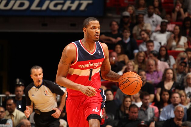 MIAMI, FL - March 10: Trevor Ariza #1 of the Washington Wizards dribbles up the court against the Miami Heat at the American Airlines Arena in Miami, Florida on March 10 2014. NOTE TO USER: User expressly acknowledges and agrees that, by downloading and/or using this photograph, user is consenting to the terms and conditions of the Getty Images License Agreement. Mandatory copyright notice: Copyright NBAE 2014 (Photo by Issac Baldizon/NBAE via Getty Images)