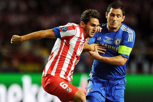 MONACO - AUGUST 31:  Frank Lampard of Chelsea in action with Koke of Atletico Madrid during the UEFA Super Cup match between Chelsea and Atletico Madrid at Louis II Stadium on August 31, 2012 in Monaco, Monaco.  (Photo by Chris Brunskill/Getty Images)