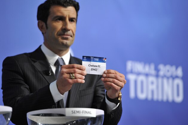 NYON, SWITZERLAND - APRIL 11:  Ambassador for the final Luis Figo draws Chelsea during the UEFA Champions League 2013/14 season semi-finals draw at the UEFA headquarters, The House of European Football, on April 11, 2014 in Nyon, Switzerland.  (Photo by Harold Cunningham/Getty Images for UEFA)