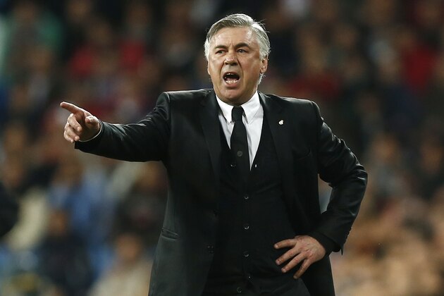 Real's coach Carlo Ancelotti directs his players during a Champions League quarterfinal first leg soccer match between Real Madrid and Borussia Dortmund at the Santiago Bernabeu   stadium in Madrid, Spain, Wednesday, April 2, 2014. (AP Photo/Andres Kudacki)