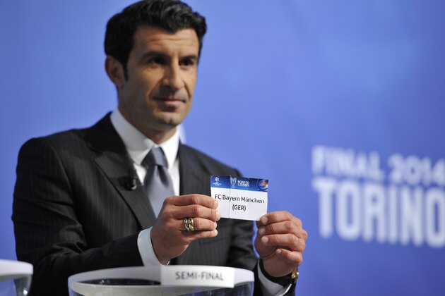 NYON, SWITZERLAND - APRIL 11:  Ambassador for the final Luis Figo draws Bayern Munich during the UEFA Champions League 2013/14 season semi-finals draw at the UEFA headquarters, The House of European Football, on April 11, 2014 in Nyon, Switzerland.  (Photo by Harold Cunningham/Getty Images for UEFA)