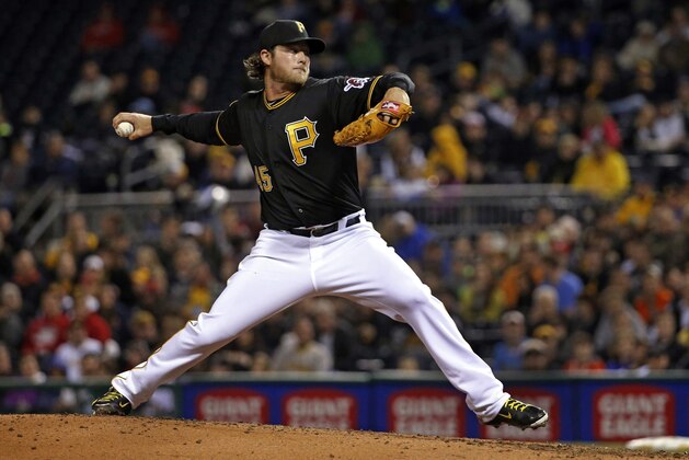 Pittsburgh Pirates starting pitcher Gerrit Cole delivers during the fourth inning of a baseball game against the St. Louis Cardinals in Pittsburgh on Friday, April 4, 2014. (AP Photo/Gene J. Puskar)