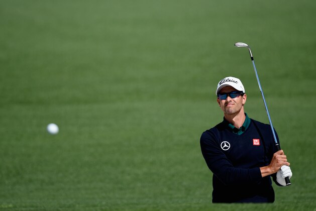 AUGUSTA, GA - APRIL 10:  Adam Scott of Australia plays a bunker shot on the second hole during the first round of the 2014 Masters Tournament at Augusta National Golf Club on April 10, 2014 in Augusta, Georgia.  (Photo by Harry How/Getty Images)