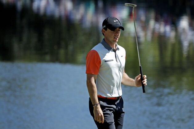 Rory McIlroy, of Northern Ireland, waits to putt on the 16th green during the first round of the Masters golf tournament Thursday, April 10, 2014, in Augusta, Ga. (AP Photo/Matt Slocum)