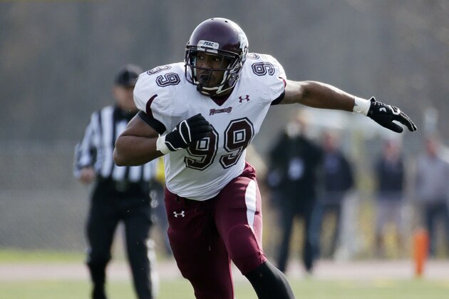Bloomsburg defensive end Larry Webster in action during a NCAA Division II college football game against West Chester, Saturday, Nov. 9, 2013, in West Chester, Pa. (AP Photo/Matt Slocum)
