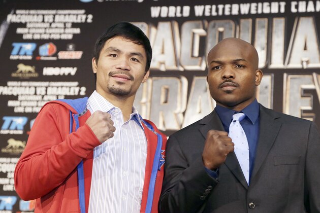Manny Pacquiao, left of the Philippines, and Tim Bradley pose at a news conference to promote their upcoming WBO welterweight championship boxing rematch in Beverly Hills, Calif., Tuesday, Feb. 4, 2014. Pacquiao and Bradley's first match on June 9, 2012 was a split decision in favor of Bradley, which ended Pacquiao's welterweight title reign as well as his seven-year, 15-bout winning streak. Pacquiao vs. Bradley 2 will take place Saturday, April 12, 2014, in Las Vegas. (AP Photo/Reed Saxon) Manny Pacquiao, left of the Philippines, and Tim Bradley pose at a news conference to promote their upcoming WBO welterweight championship boxing rematch in Beverly Hills, Calif., Tuesday, Feb. 4, 2014. Pacquiao and Bradley's first match on June 9, 2012 was a split decision in favor of Bradley, which ended Pacquiao's welterweight title reign as well as his seven-year, 15-bout winning streak. Pacquiao vs. Bradley 2 will take place Saturday, April 12, 2014, in Las Vegas. (AP Photo/Reed Saxon)