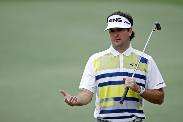 Bubba Watson walks down the 14th fairway during the second round of the Masters golf tournament Friday, April 11, 2014, in Augusta, Ga. (AP Photo/Matt Slocum)