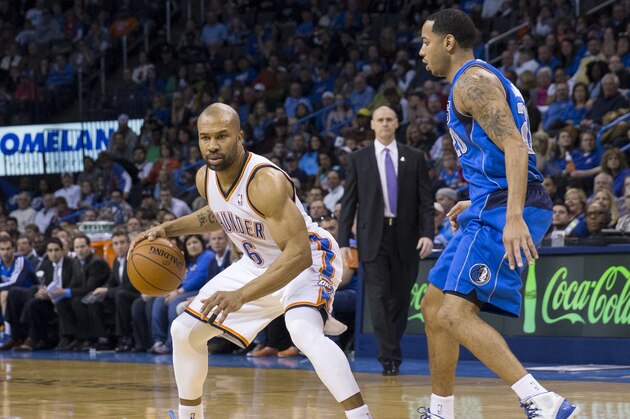 OKLAHOMA CITY, OK - March 16, 2014: Derek Fisher #6 of the Oklahoma City Thunder handles the ball against Devin Harris #20 of the Dallas Mavericks at the Chesapeake Arena on March 16, 2014 in Oklahoma City, Oklahoma. NOTE TO USER:  User expressly acknowledges and agrees that, by downloading and/or using this photograph, user is consenting to the terms and conditions of the Getty Images License Agreement. Mandatory Copyright Notice:  Copyright 2014 NBAE (Photo by Richard Rowe/NBAE via Getty Images)
