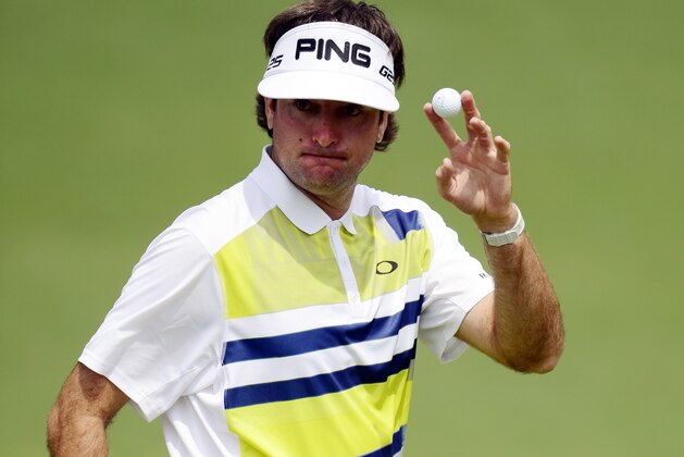 Apr 11, 2014; Augusta, GA, USA; Bubba Watson holds up a ball after making a putt on the 10th hole during the second round of the 2014 The Masters golf tournament at Augusta National Golf Club. Mandatory Credit: Michael Madrid-USA TODAY Sports