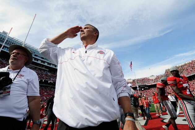 COLUMBUS, OH - SEPTEMBER 15:  Head Coach Urban Meyer of the Ohio State Buckeyes salutes the students after Ohio State defeated the California Golden Bears 35-28 at Ohio Stadium on September 15, 2012 in Columbus, Ohio.  (Photo by Jamie Sabau/Getty Images)