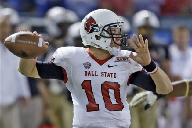 Ball State quarterback Keith Wenning throws a pass against Central Florida during the first quarter of the Beef 'O' Brady's Bowl NCAA college football game Friday, Dec. 21, 2012, in St Petersburg, Fla. (AP Photo/Chris O'Meara)