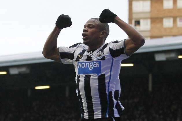 Newcastle United's Loic Remy celebrates his goal against  West Ham United during their English Premier League soccer match at Upton Park, London, Saturday, Jan. 18, 2014. (AP Photo/Sang Tan)