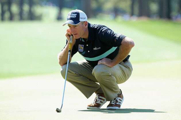 AUGUSTA, GA - APRIL 10:  Jim Furyk of the United States lines up a putt on the fiduring the first round of the 2014 Masters Tournament at Augusta National Golf Club on April 10, 2014 in Augusta, Georgia.  (Photo by Andrew Redington/Getty Images)