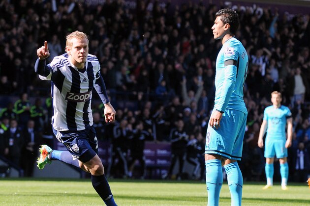 West Brom's Matej Vydra, left, celebrates after scoring against Tottenham during the English Premier League soccer match between West Bromwich Albion and Tottenham Hotspur at The Hawthorns Stadium in West Bromwich, England, Saturday, April 12, 2014.  (AP Photo/Rui Vieira)