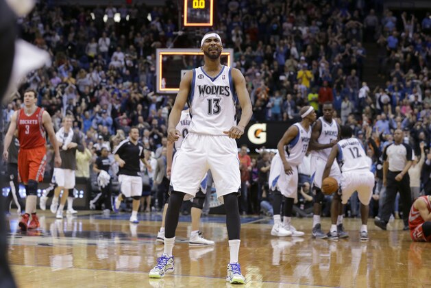Minnesota Timberwolves forward Corey Brewer reacts after the Timberwolves defeated the Houston Rockets 112-110 during an NBA basketball game in Minneapolis, Friday, April 11, 2014. (AP Photo/Ann Heisenfelt)