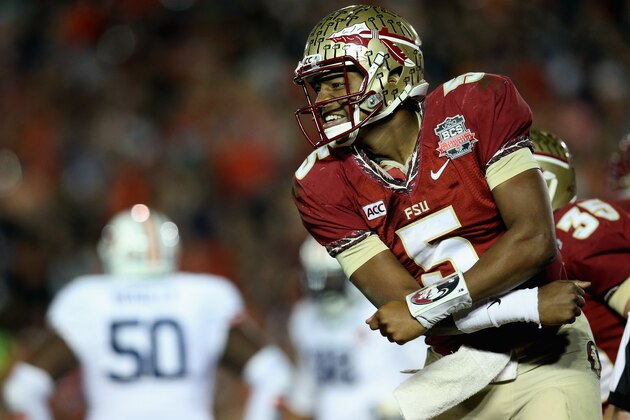 PASADENA, CA - JANUARY 06:  Quarterback Jameis Winston #5 of the Florida State Seminoles celebrates after a 2-yard pass for a touchdown to take a 33-31 lead over the Auburn Tigers in the final moments of the fourth quarter during the 2014 Vizio BCS National Championship Game at the Rose Bowl on January 6, 2014 in Pasadena, California. Florida State lead 34-31 after a successful extra point.  (Photo by Stephen Dunn/Getty Images)