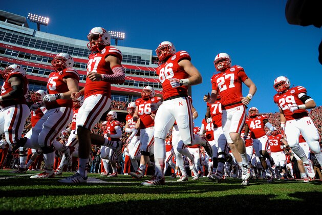 LINCOLN, NE - NOVEMBER 29: The Nebraska Cornhuskers take the field before their game against the Iowa Hawkeyes at Memorial stadium on November 29, 2013 in Lincoln, Nebraska. (Photo by Eric Francis/Getty Images) LINCOLN, NE - NOVEMBER 29: The Nebraska Cornhuskers take the field before their game against the Iowa Hawkeyes at Memorial stadium on November 29, 2013 in Lincoln, Nebraska. (Photo by Eric Francis/Getty Images)