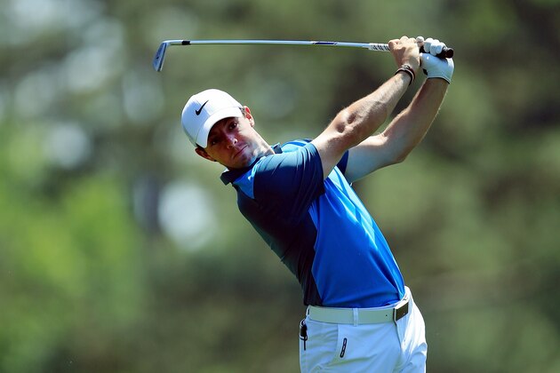 AUGUSTA, GA - APRIL 12:  Rory McIlroy of Northern Ireland watches his approach shot on the 14th hole during the third round of the 2014 Masters Tournament at Augusta National Golf Club on April 12, 2014 in Augusta, Georgia.  (Photo by David Cannon/Getty Images)